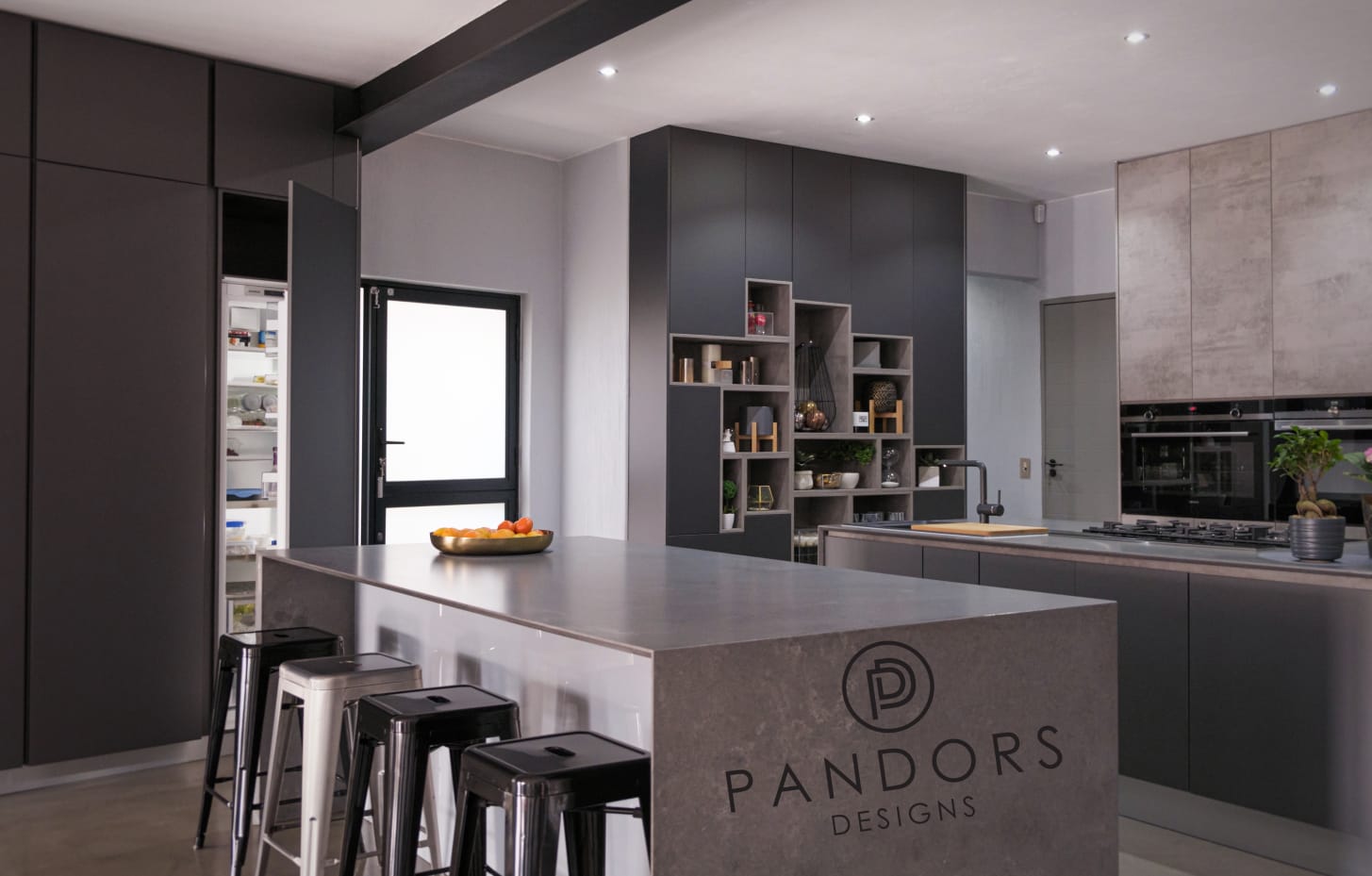 Precision-fitted Pandors Designs kitchen in slate grey and rosewood-finish cabinetry